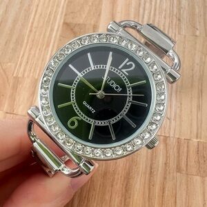 Studio time ladies black dial silver tone cuff bracelet watch NEW BATTERY